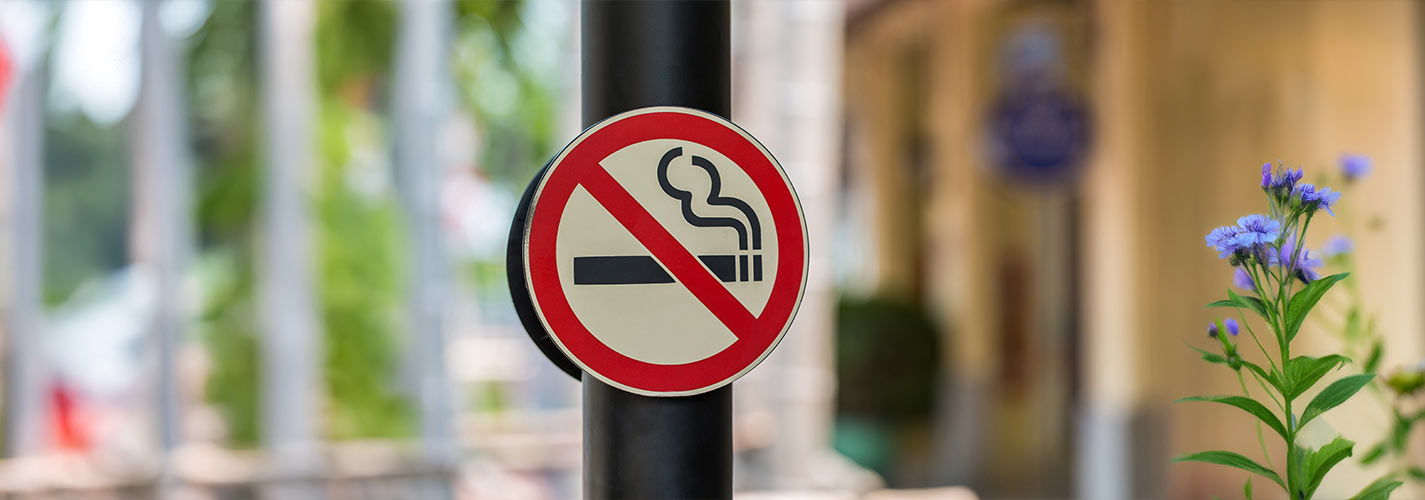 A no-smoking sign on a pole